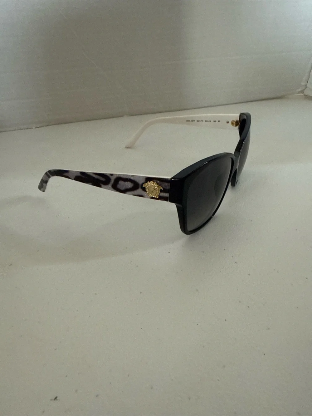 Versace Women's Purple Leopard Print Sunglasses with Gold Medusa Accent